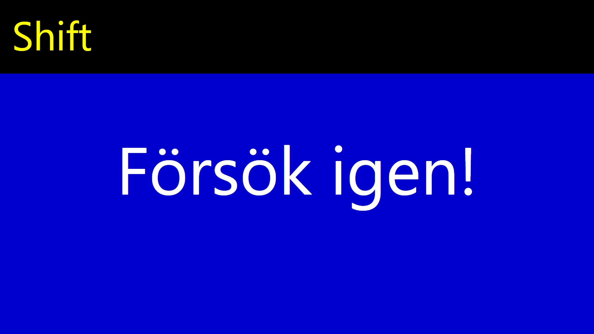 Övningen Specialtangenter visar tangenten Shift och meddelandet Försök igen i stor text.